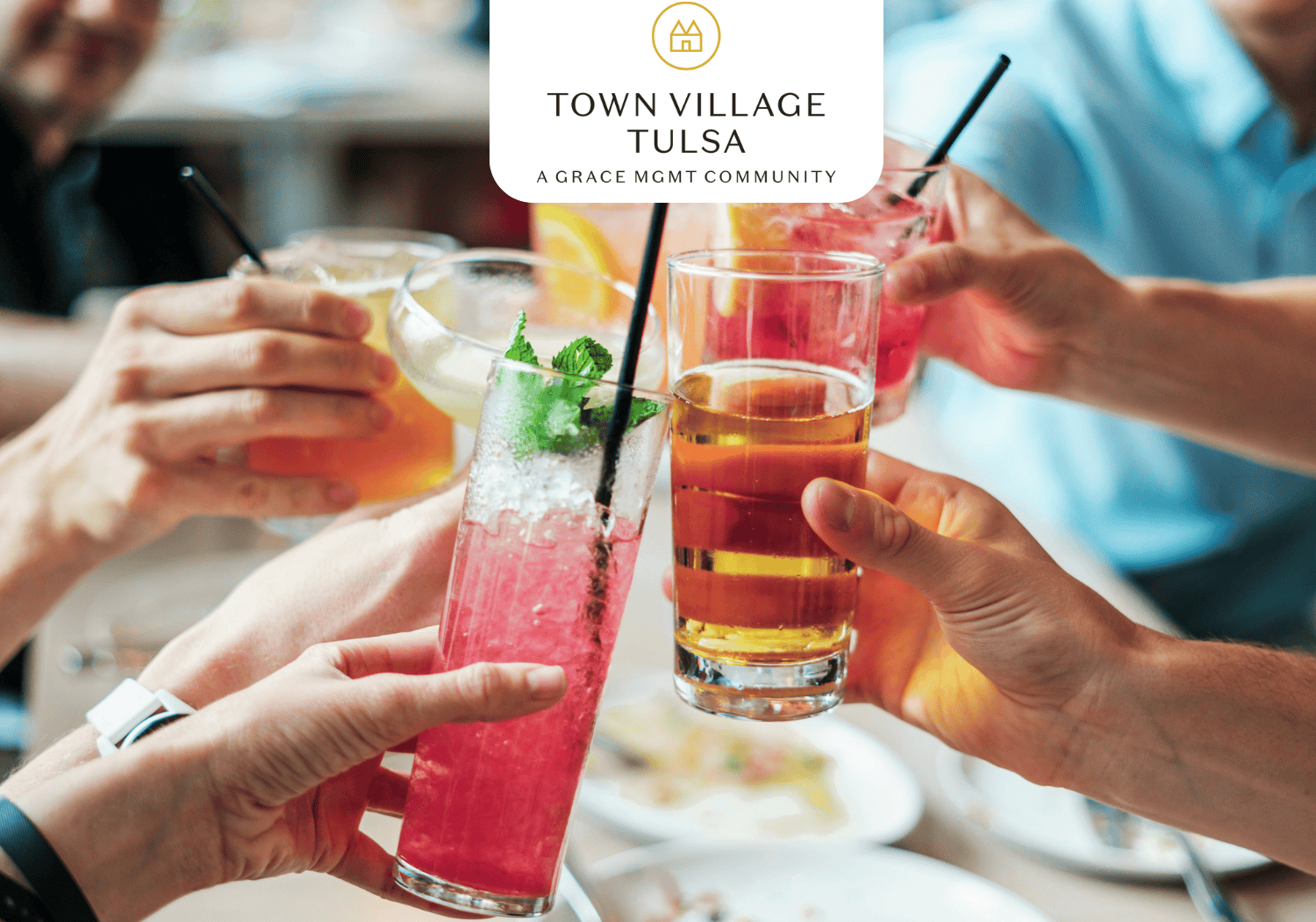 Town Village Tulsa - Cocktails and Mocktails - Town Village Tulsa cocktails being toasted